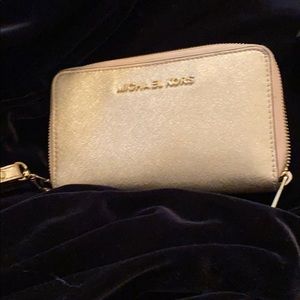 Michael Kors gold wristlet